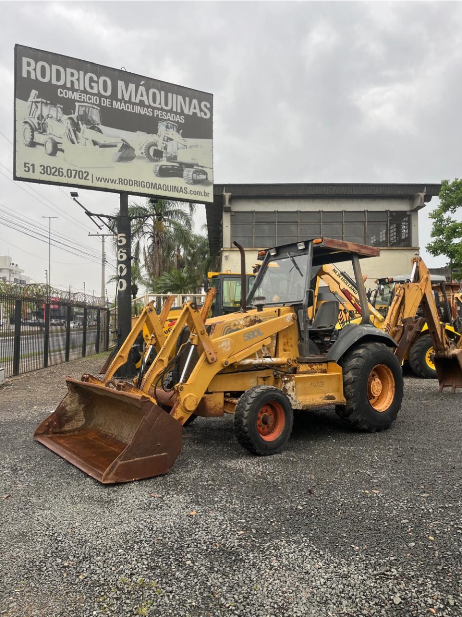 Retroescavadeira Case 580 L ano 1998
